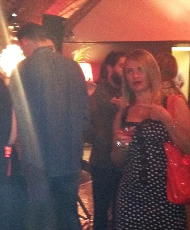 Caroline Flack wardrobe malfunction she flashes her bra at Bacardi